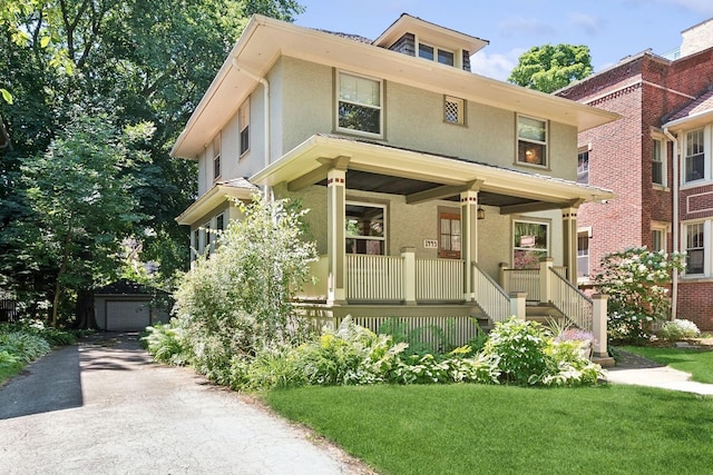 view of front of house with a front lawn and a porch