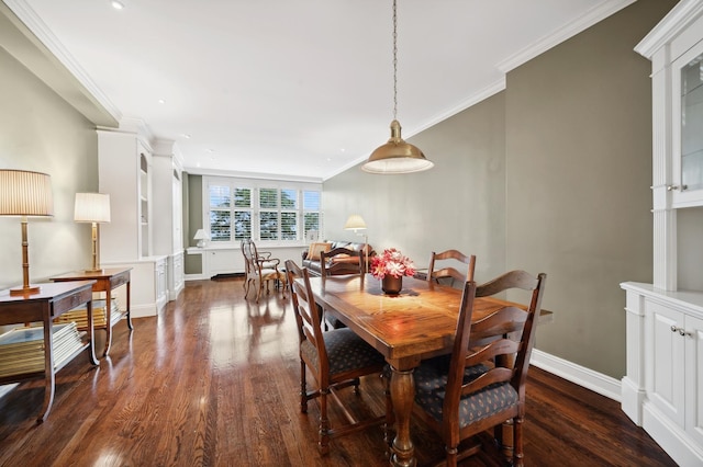dining space with recessed lighting, dark wood finished floors, baseboards, and ornamental molding