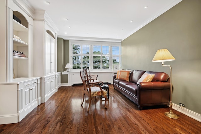 living room featuring dark wood-type flooring and ornamental molding