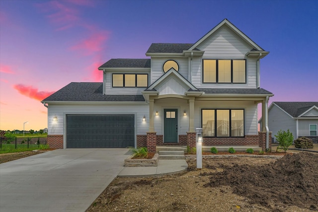 view of front of home with a garage