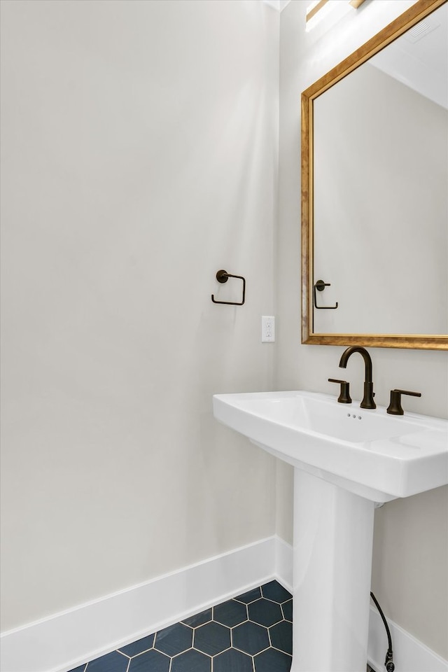 bathroom featuring tile floors