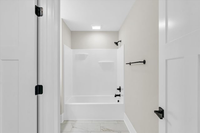 bathroom featuring tile flooring and  shower combination