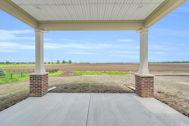 view of patio / terrace featuring a rural view