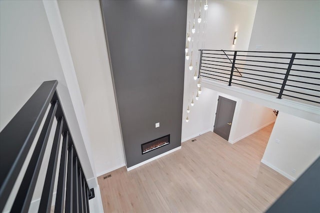 staircase featuring hardwood / wood-style floors