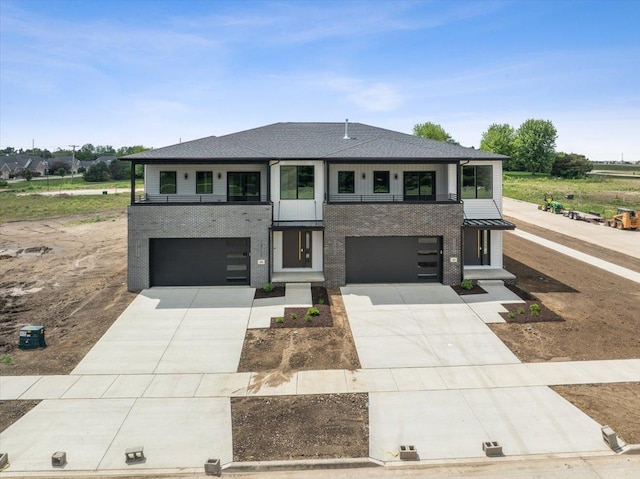 prairie-style home featuring a garage