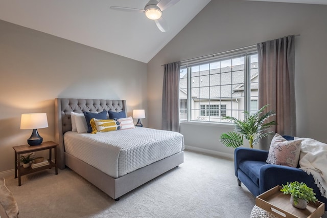 carpeted bedroom with high vaulted ceiling and ceiling fan