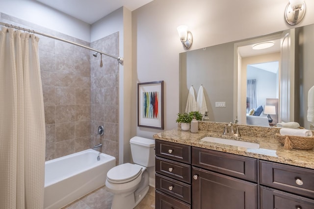 full bathroom with tile patterned flooring, shower / bath combo, toilet, and vanity