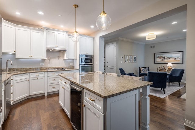 kitchen featuring white cabinets, dark hardwood / wood-style floors, wine cooler, and sink