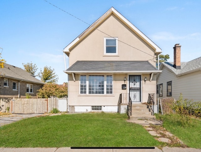 view of front of property featuring a front yard