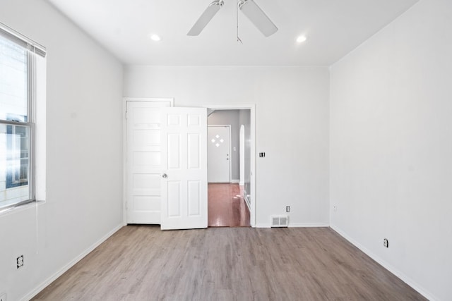 unfurnished bedroom featuring light hardwood / wood-style floors and ceiling fan