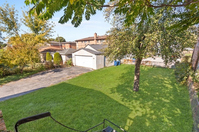 view of front of house featuring a garage and a front yard