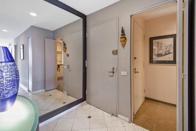 bathroom with tile flooring