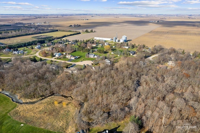 birds eye view of property featuring a rural view