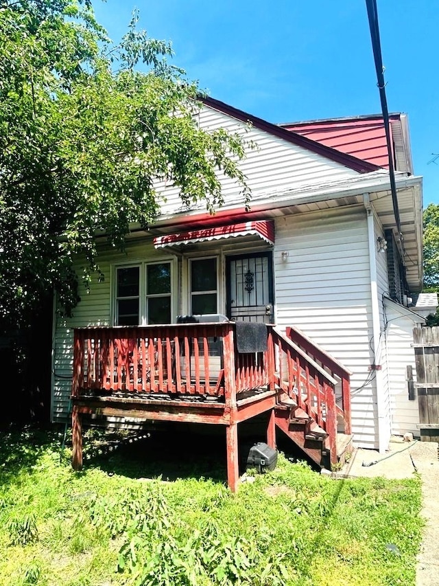 rear view of house with a deck