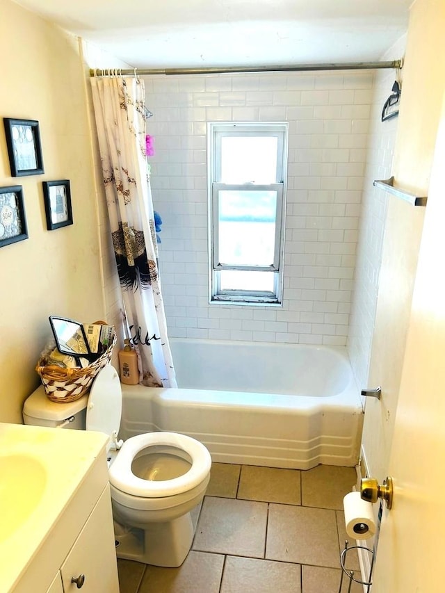 full bathroom with tile patterned floors, vanity, shower / bath combination with curtain, and toilet