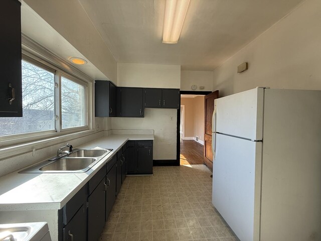 bathroom featuring shower / bathtub combination with curtain and sink