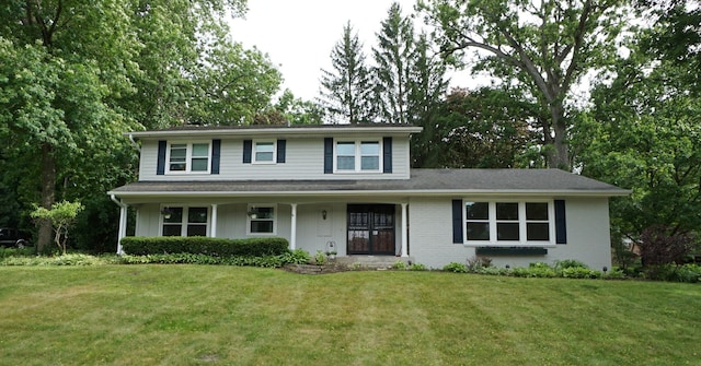 view of front of property with a front lawn