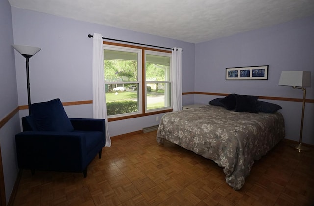 bedroom with parquet floors