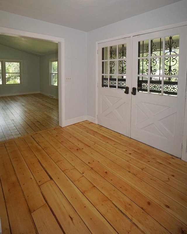 spare room featuring hardwood / wood-style floors