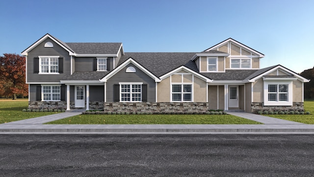 view of front of home featuring a front lawn