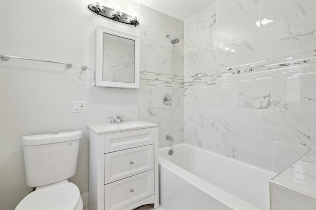 full bathroom with vanity, toilet, and tiled shower / bath combo