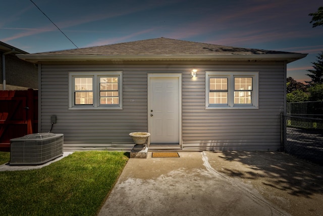 view of front of home featuring a patio area and central AC