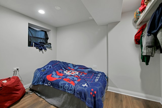 bedroom featuring hardwood / wood-style flooring