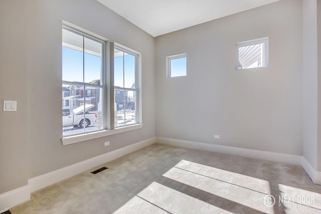 unfurnished room with carpet