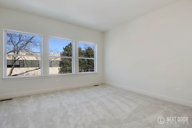 view of carpeted spare room