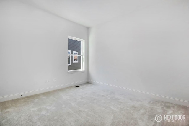 view of carpeted spare room