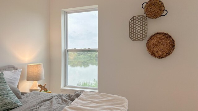 bedroom with a water view