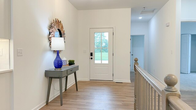 foyer entrance featuring light hardwood / wood-style floors