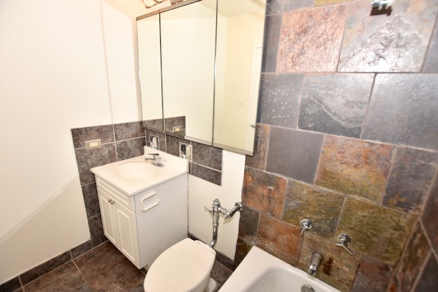 full bathroom with tile flooring, tasteful backsplash, tile walls, toilet, and vanity