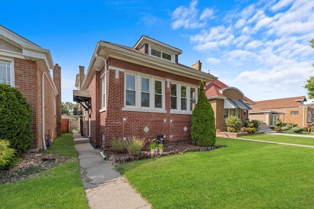 bungalow with a front lawn