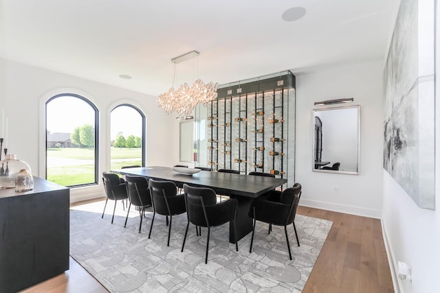15W601 Grant St, Burr Ridge, IL 60527 - dining room featuring a chandelier and hardwood / wood-style floors