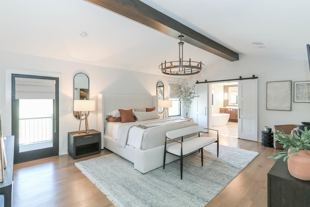 15W601 Grant St, Burr Ridge, IL 60527 - bedroom featuring hardwood / wood-style floors, a barn door, ensuite bathroom, and vaulted ceiling with beams