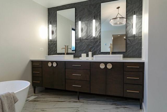 15W601 Grant St, Burr Ridge, IL 60527 - bathroom with a tub, vanity, a chandelier, and tile walls