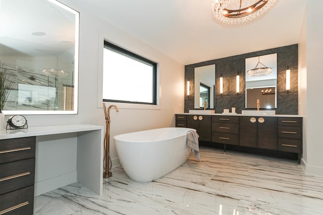 15W601 Grant St, Burr Ridge, IL 60527 - bathroom featuring a notable chandelier, vanity, and separate shower and tub