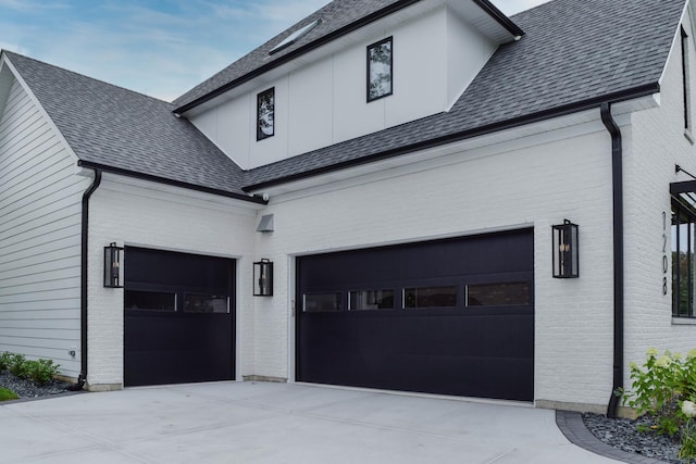 15W601 Grant St, Burr Ridge, IL 60527 - view of property exterior with a garage