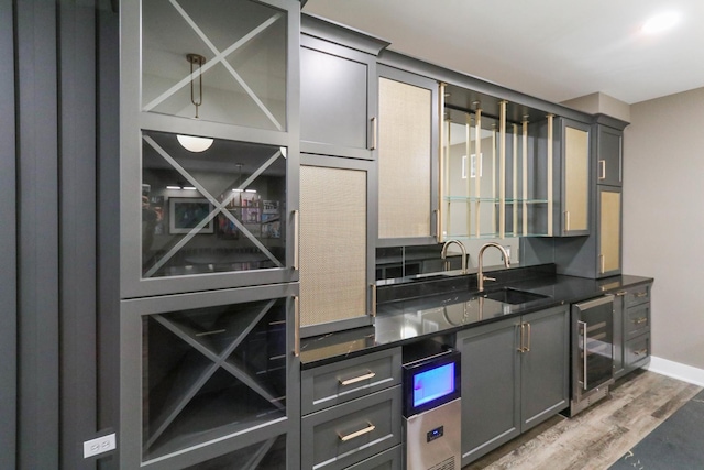 15W601 Grant St, Burr Ridge, IL 60527 - kitchen featuring hardwood / wood-style flooring, gray cabinets, sink, and beverage cooler