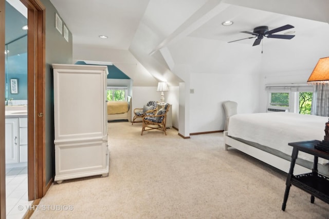 bedroom with light carpet, visible vents, multiple windows, and vaulted ceiling