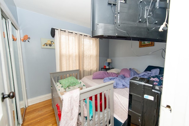 bedroom featuring wood-type flooring