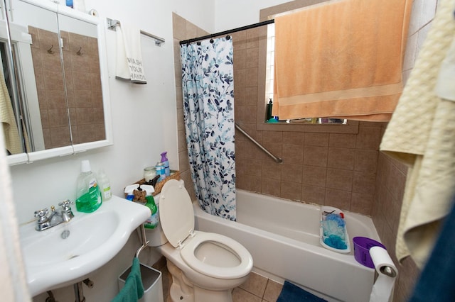 full bathroom with shower / bath combination with curtain, toilet, tile patterned floors, and sink