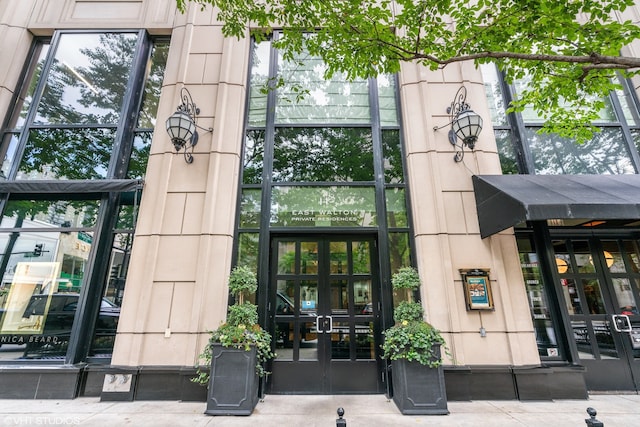 entrance to property featuring french doors