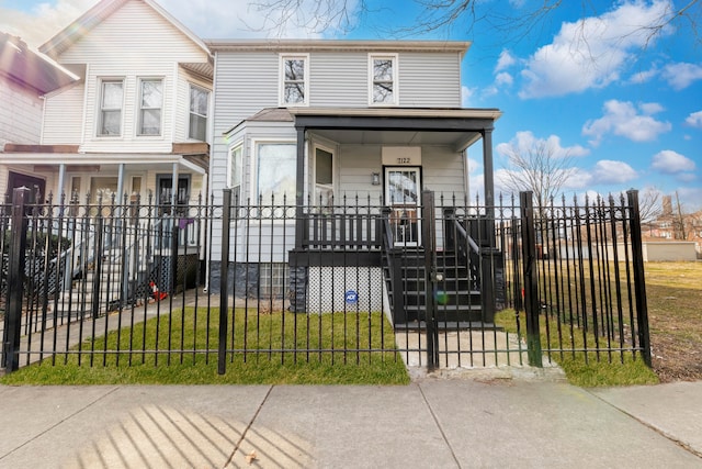 view of front of property with a front lawn and a porch