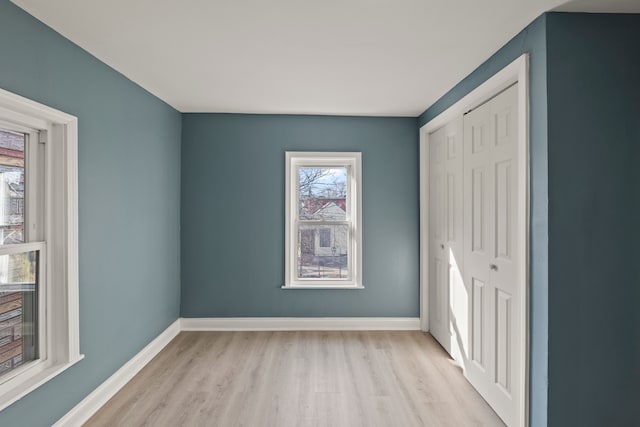 unfurnished bedroom with light hardwood / wood-style floors