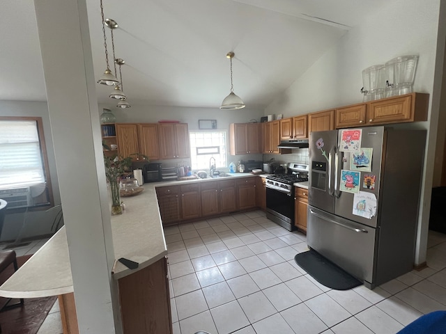 kitchen featuring stainless steel appliances, pendant lighting, high vaulted ceiling, sink, and light tile patterned floors