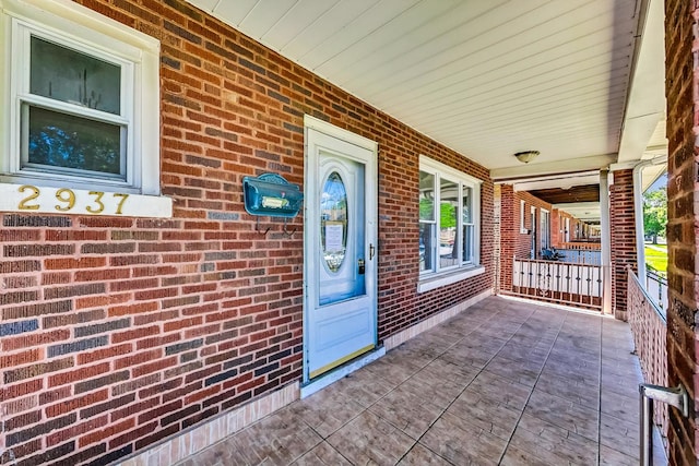 entrance to property with covered porch