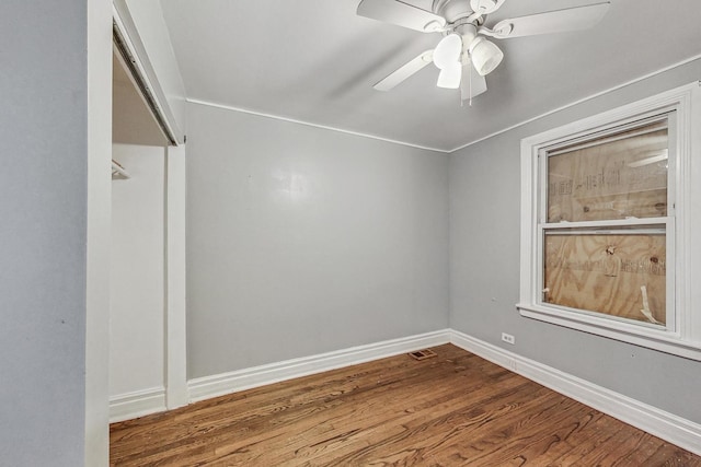 unfurnished room featuring ceiling fan and wood-type flooring