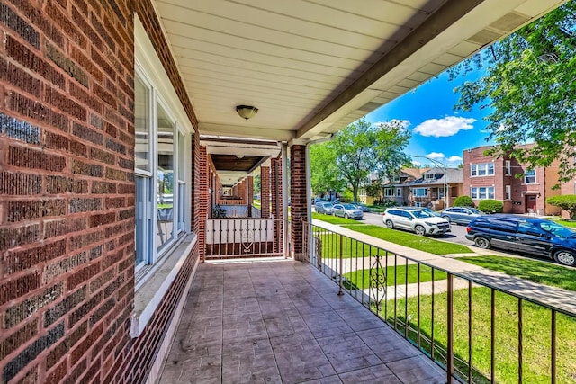 balcony featuring a porch